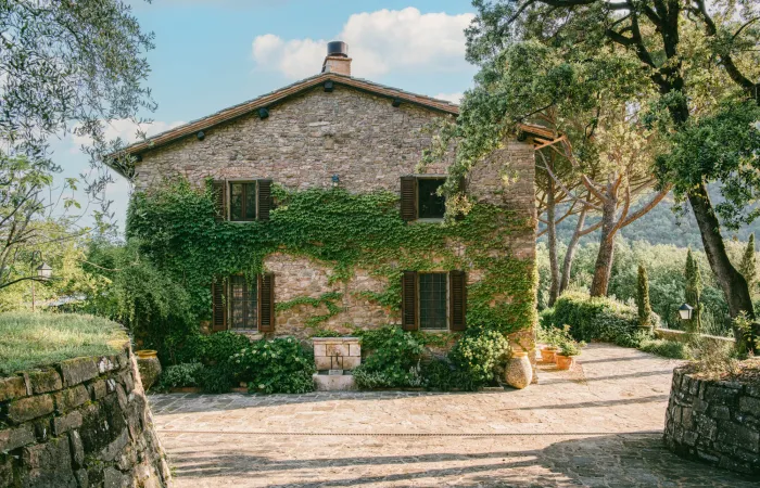 Antique fountain welcomes you to your private Tuscan retreat.