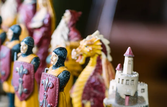 Handcrafted chess pieces add charm to the library’s cozy game corner.