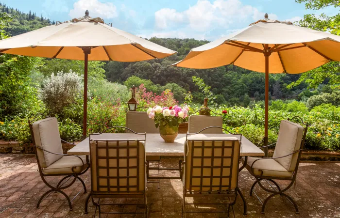 Outdoor patio with views of Castello Sezzate and Castello Mugnana.
