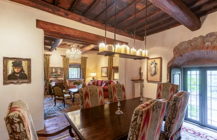 Living and dining rooms open to a panoramic terrace with seating for twelve.