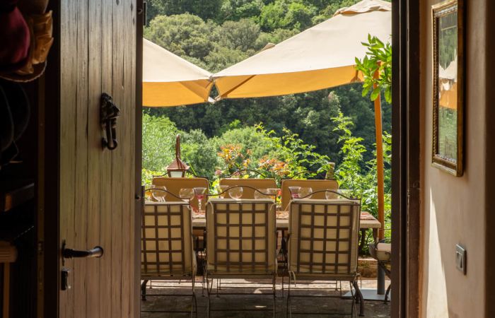 Private entrance with outdoor living patio