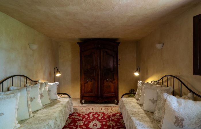 Lower-Level Bedroom with two daybeds and a full closet.