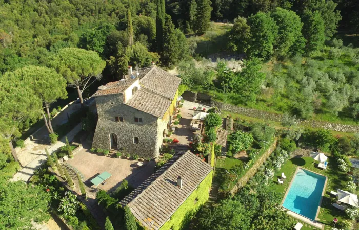 Aerial view of the villa, guest house, terraces and pool.