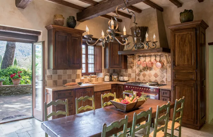 Farmhouse table carved from a centuries-old trunk, with seating for ten.