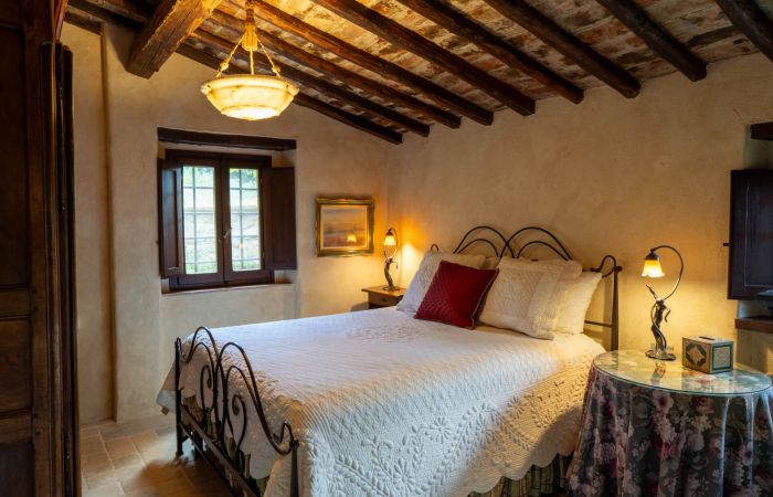 Guest House Queen Bedroom with garden views.