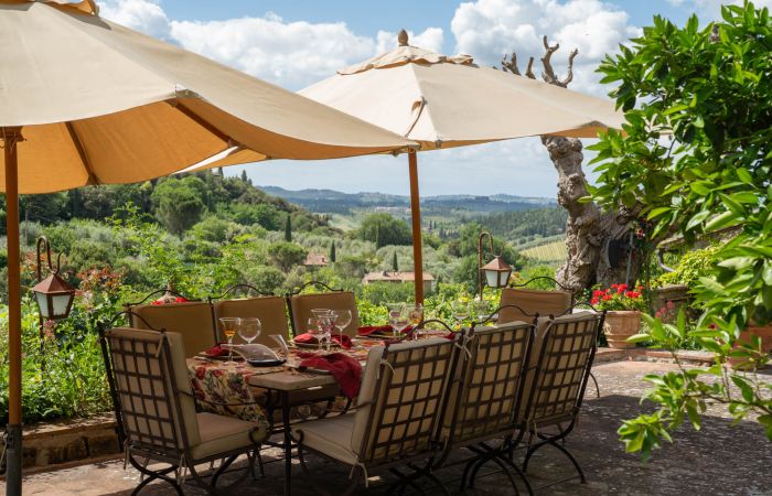 Outdoor patio with views of Castello Sezzate and Castello Mugnana.